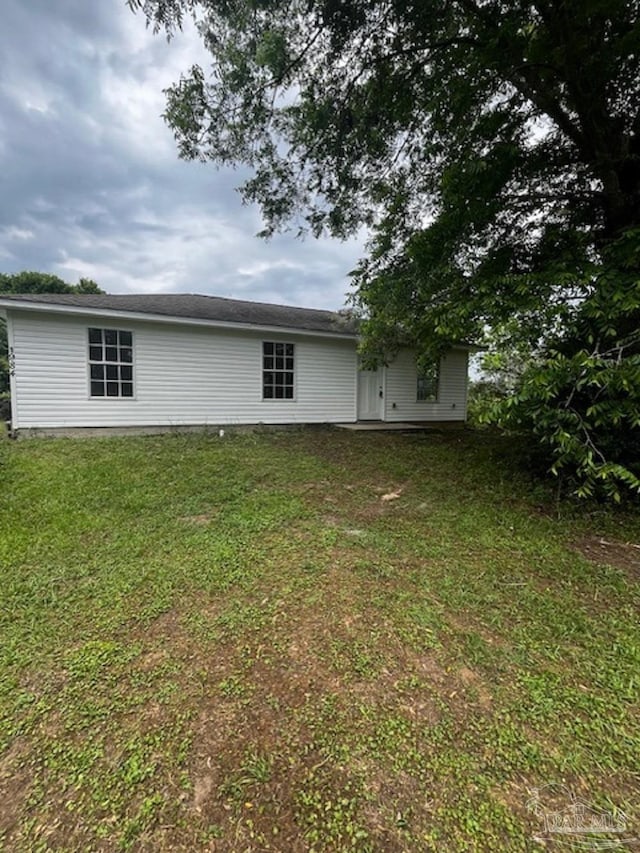 1984 Hillary Thompson Rd, Milton, FL 32570 - back of house with a yard