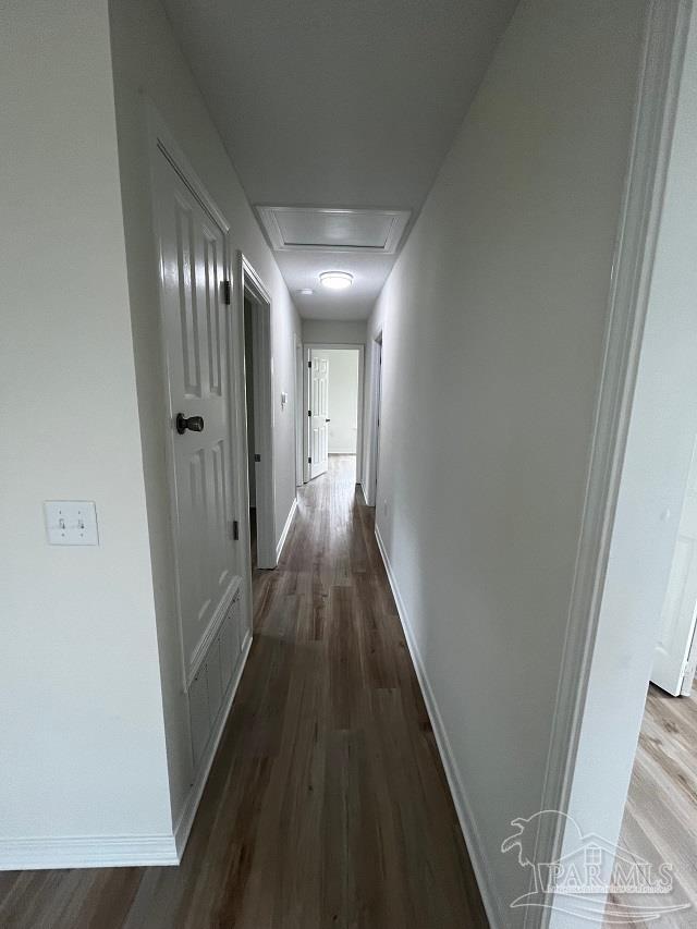 1984 Hillary Thompson Rd, Milton, FL 32570 - hall with wood finished floors and baseboards