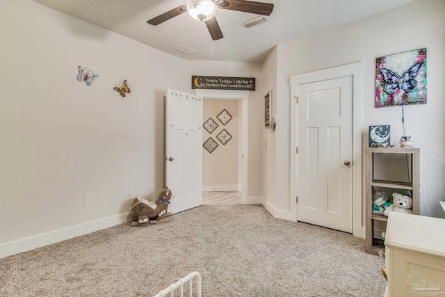 unfurnished bedroom with carpet flooring and ceiling fan