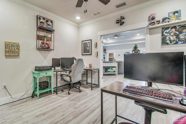 office space featuring ceiling fan, ornamental molding, and light wood-type flooring