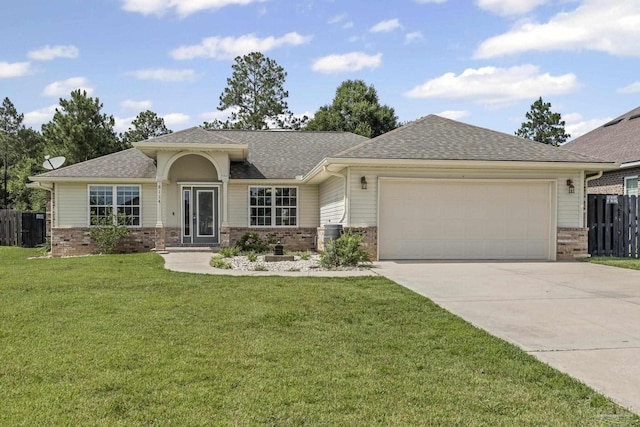 8114 Silver Maple Dr, Milton, FL 32583 - view of front of home featuring brick siding, an attached garage, concrete driveway, and a shingled roof