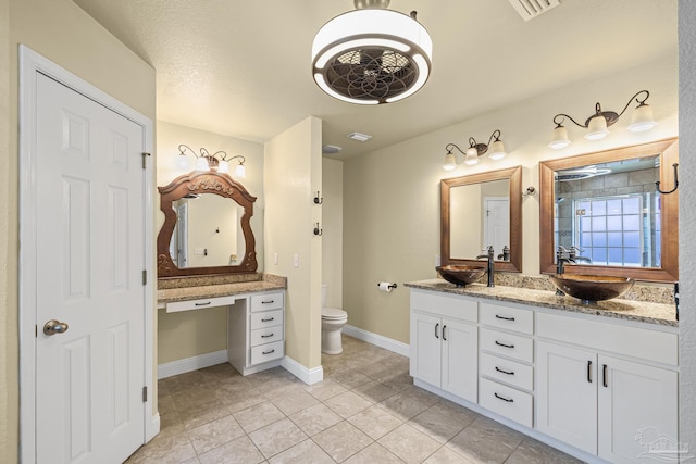 8114 Silver Maple Dr, Milton, FL 32583 - full bath featuring double vanity, tile patterned flooring, and a shower