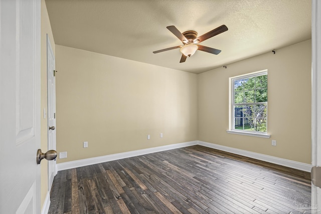 8114 Silver Maple Dr, Milton, FL 32583 - unfurnished room with dark wood-type flooring, ceiling fan, and a textured ceiling
