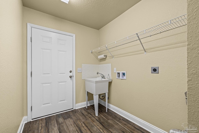 8114 Silver Maple Dr, Milton, FL 32583 - washroom with hookup for an electric dryer, dark wood-style floors, and washer hookup