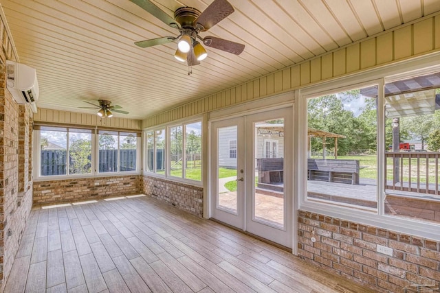 8114 Silver Maple Dr, Milton, FL 32583 - unfurnished sunroom featuring ceiling fan, a wall mounted air conditioner, and french doors