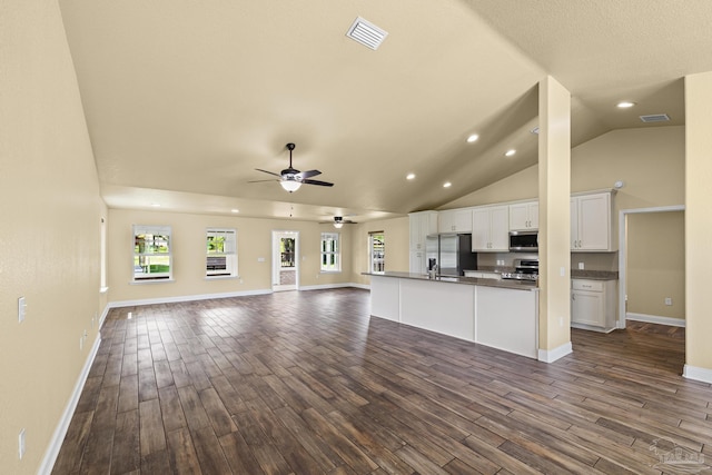8114 Silver Maple Dr, Milton, FL 32583 - unfurnished living room with dark wood finished floors, a ceiling fan, recessed lighting, and high vaulted ceiling