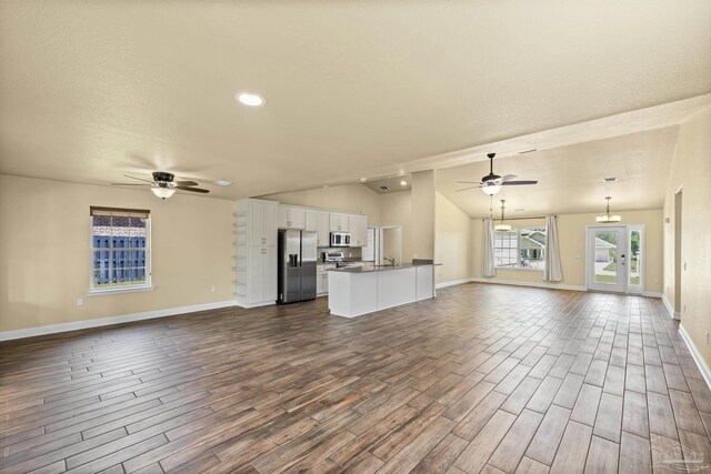 8114 Silver Maple Dr, Milton, FL 32583 - unfurnished living room with ceiling fan, dark wood-style flooring, vaulted ceiling, and recessed lighting