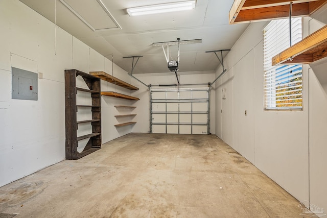 garage with electric panel and a garage door opener