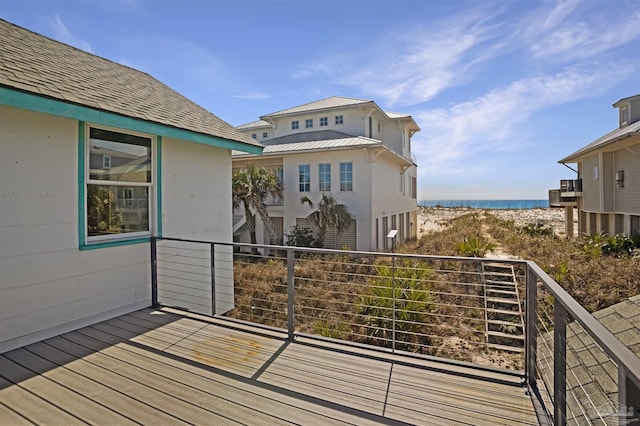 deck featuring a water view