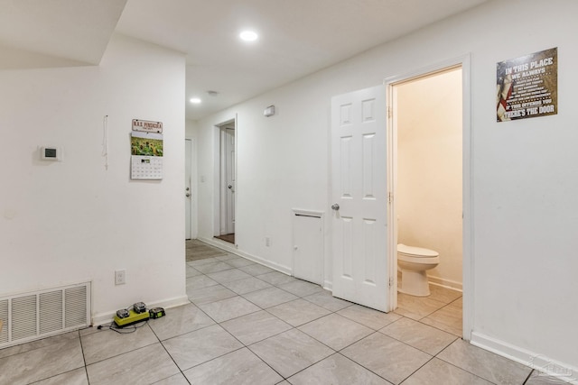 8140 Lillian Hwy, Pensacola, FL 32506 - hallway with recessed lighting, light tile patterned floors, and baseboards