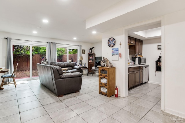 8140 Lillian Hwy, Pensacola, FL 32506 - living area with light tile patterned floors, recessed lighting, and baseboards
