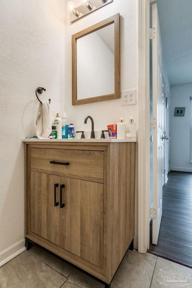 8140 Lillian Hwy, Pensacola, FL 32506 - bathroom with vanity and baseboards
