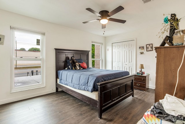 8140 Lillian Hwy, Pensacola, FL 32506 - bedroom with baseboards, dark wood-style flooring, a closet, and ceiling fan