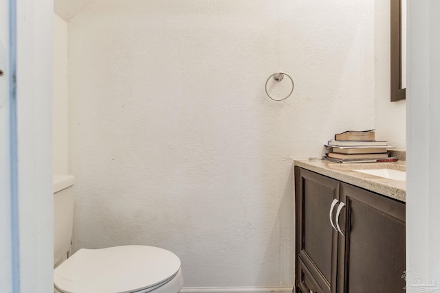 8140 Lillian Hwy, Pensacola, FL 32506 - half bathroom with toilet and vanity