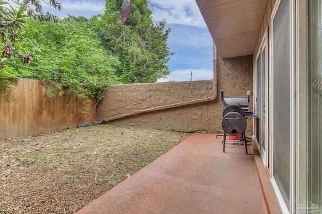8140 Lillian Hwy, Pensacola, FL 32506 - fenced backyard with a patio