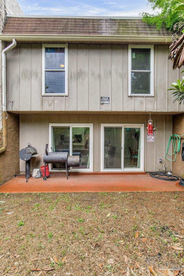 8140 Lillian Hwy, Pensacola, FL 32506 - back of house featuring a patio