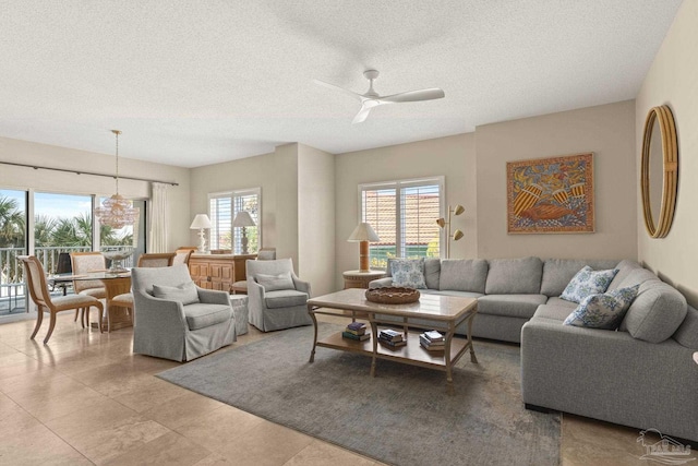 751 Pensacola Beach Blvd Unit 2F, Pensacola Beach, FL 32561 - living area with ceiling fan and a textured ceiling