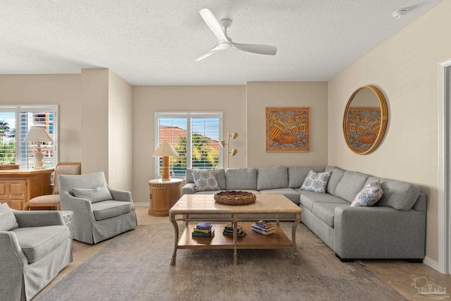 751 Pensacola Beach Blvd Unit 2F, Pensacola Beach, FL 32561 - living area with a ceiling fan and a textured ceiling
