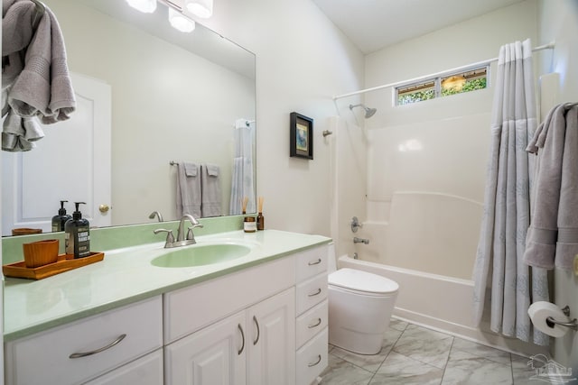 full bathroom featuring vanity, shower / bath combination with curtain, and toilet