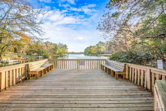 deck featuring a water view