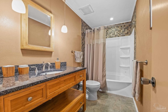 full bathroom featuring tile patterned floors, vanity, toilet, and shower / bath combo with shower curtain