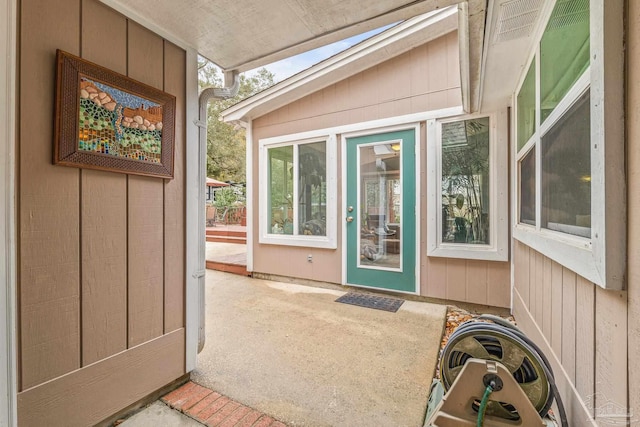 doorway to property featuring a patio