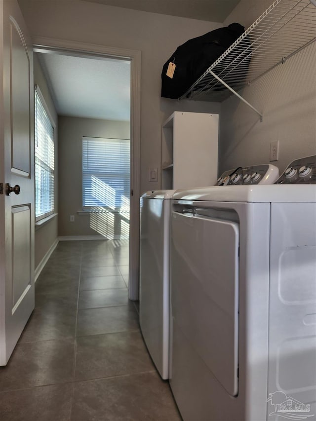 washroom featuring washer and dryer