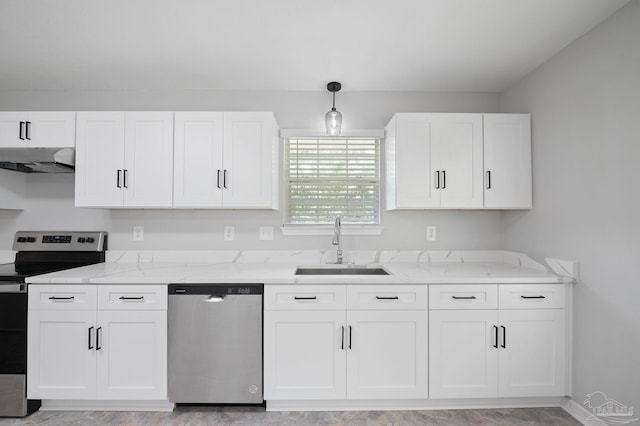 kitchen with hanging light fixtures, appliances with stainless steel finishes, white cabinetry, a sink, and under cabinet range hood