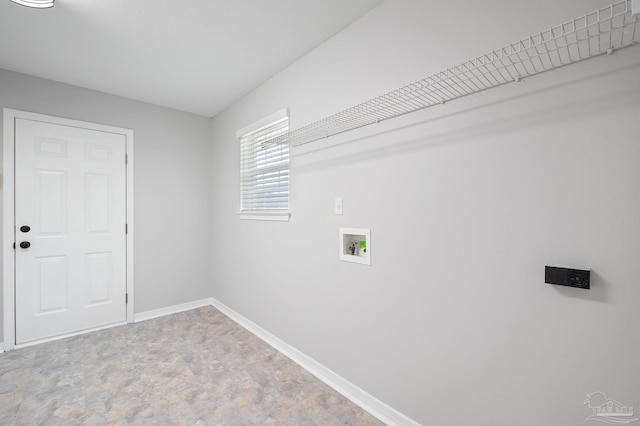 laundry room with laundry area, hookup for a washing machine, and baseboards