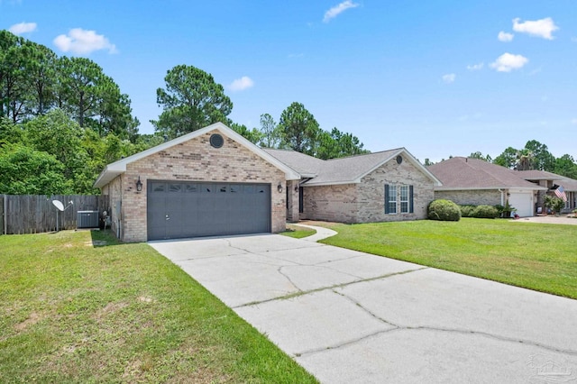 single story home featuring an attached garage, brick siding, fence, driveway, and a front lawn