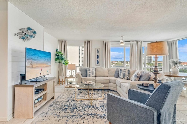 900 Gulf Shore Dr Unit 2051, Destin, FL 32541 - living room featuring a textured ceiling and light tile patterned flooring