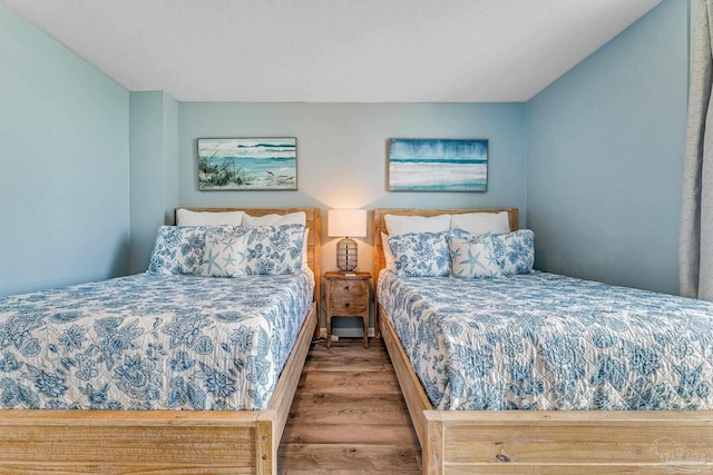 bedroom with light hardwood / wood-style floors