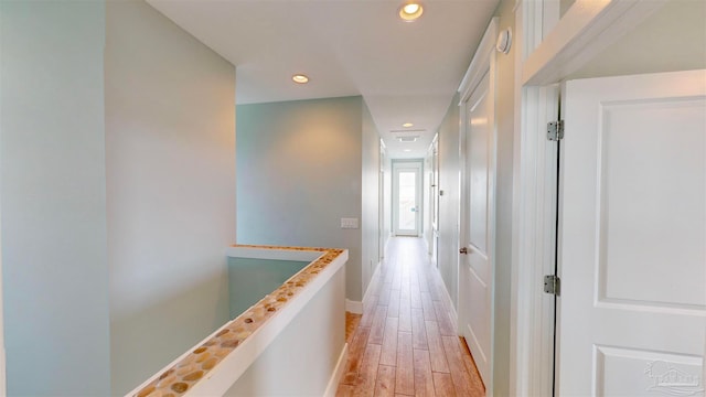 hallway featuring light wood-type flooring