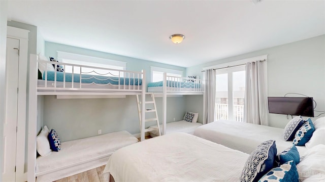 bedroom with hardwood / wood-style flooring