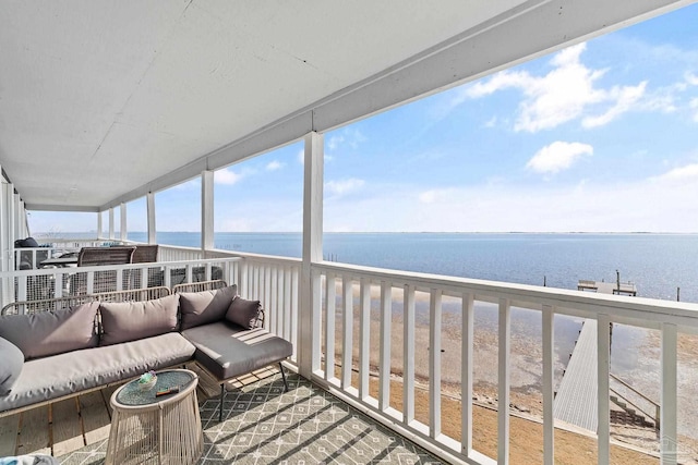 balcony featuring a water view