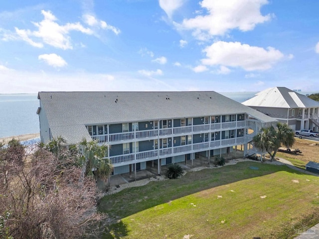 view of building exterior featuring a water view