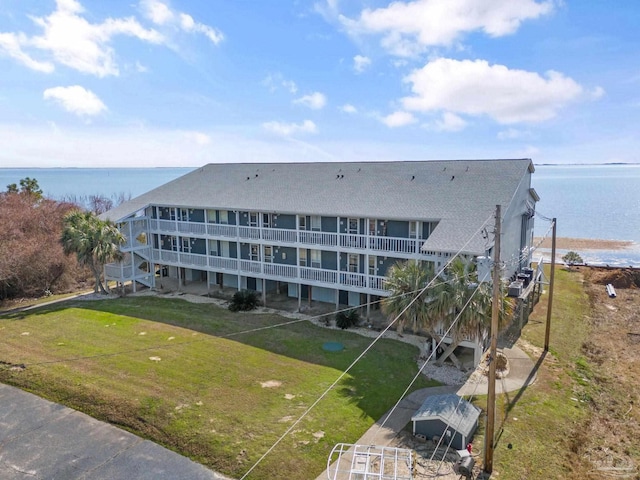 view of building exterior with a water view