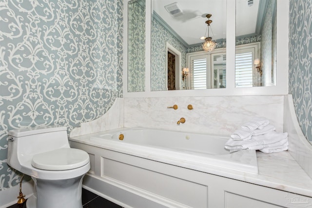 bathroom with toilet and a bathing tub