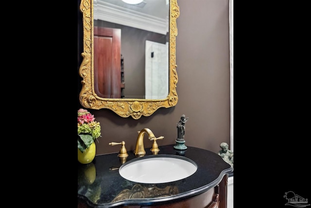 bathroom featuring vanity and crown molding