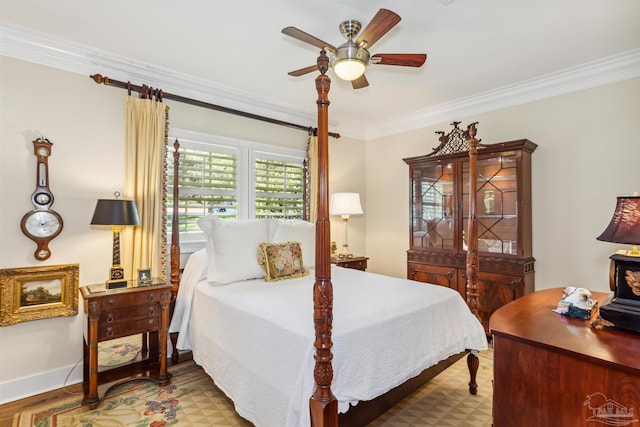 bedroom featuring crown molding and ceiling fan