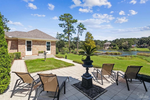 view of patio featuring a water view