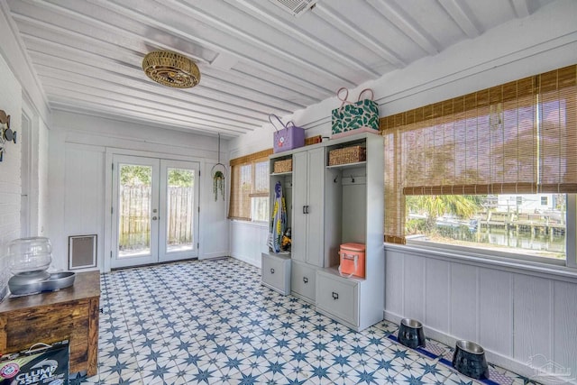 sunroom featuring french doors