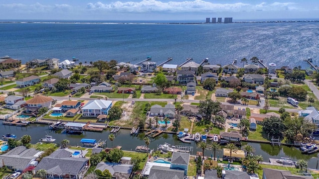 aerial view featuring a water view and a residential view