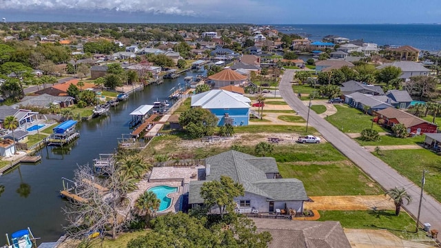 aerial view with a residential view and a water view