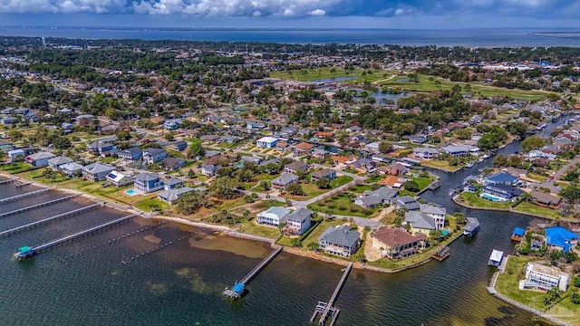 aerial view featuring a water view and a residential view