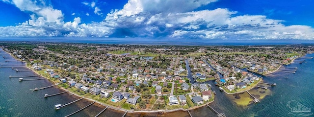 bird's eye view with a residential view and a water view