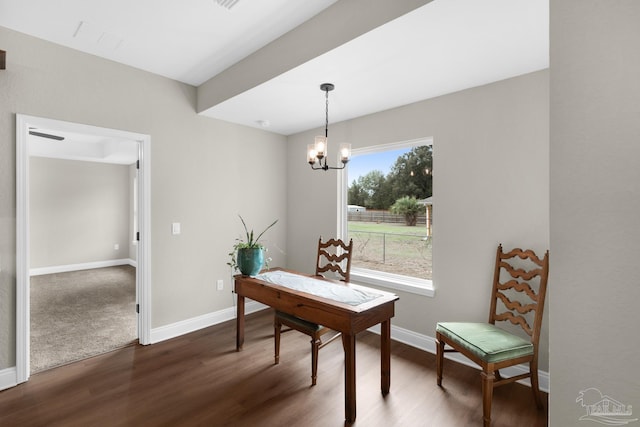 5681 Paddlewheel Dr, Milton, FL 32583 - office space with dark wood finished floors, a chandelier, and baseboards