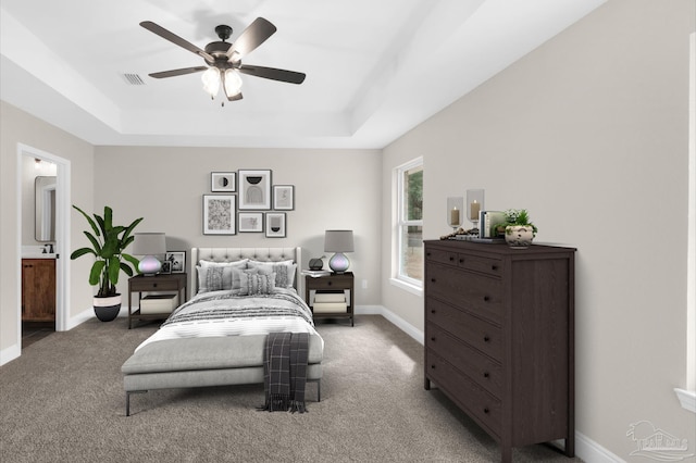 5681 Paddlewheel Dr, Milton, FL 32583 - bedroom with a raised ceiling, carpet flooring, and baseboards