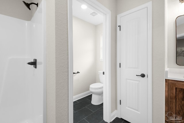 5681 Paddlewheel Dr, Milton, FL 32583 - full bathroom featuring toilet, vanity, tile patterned flooring, and a shower