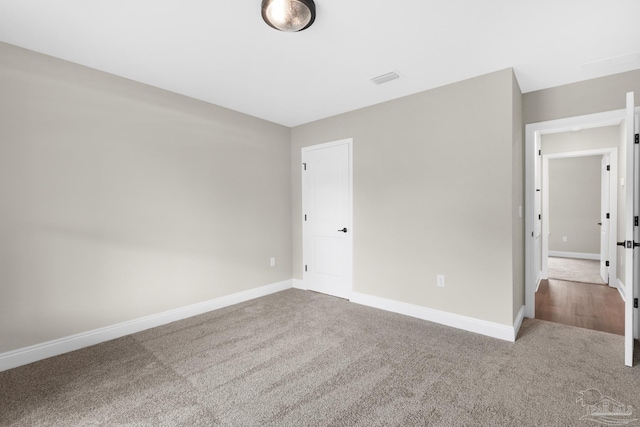 5681 Paddlewheel Dr, Milton, FL 32583 - unfurnished bedroom with carpet floors and baseboards